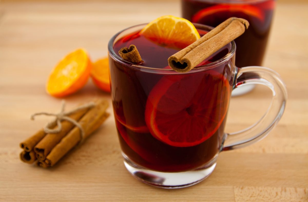 Mug of svařák mulled wine with orange and cinnamon