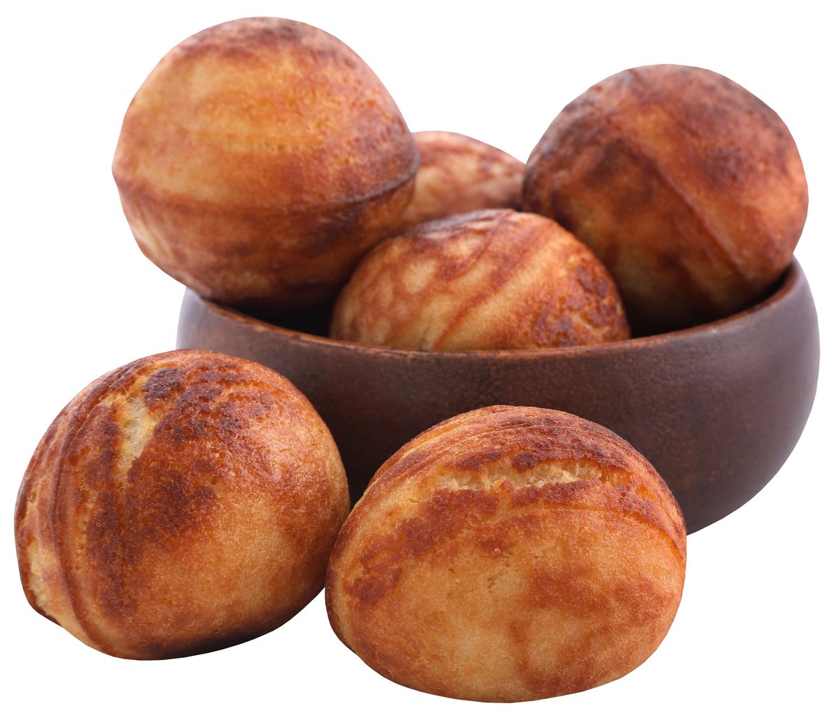 Round æbleskiver pancake puffs in a bowl
