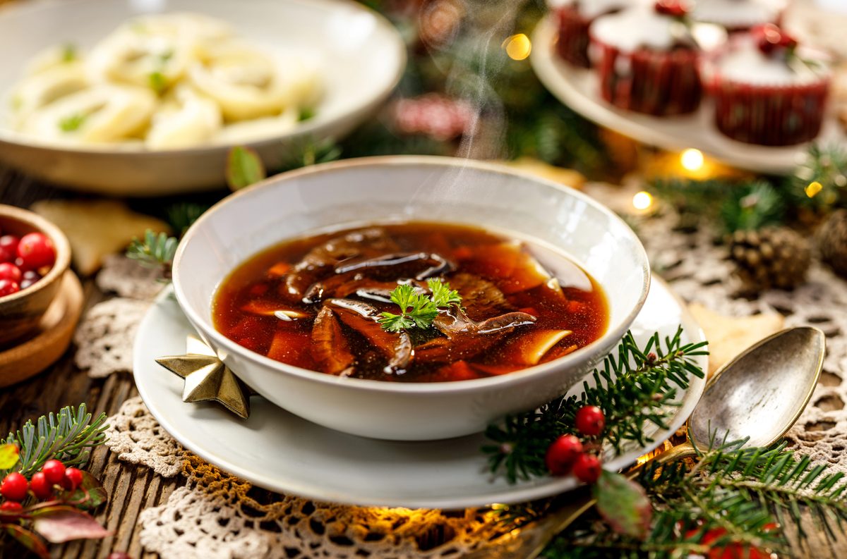 Christmas mushroom soup in a white bowl on a festive table