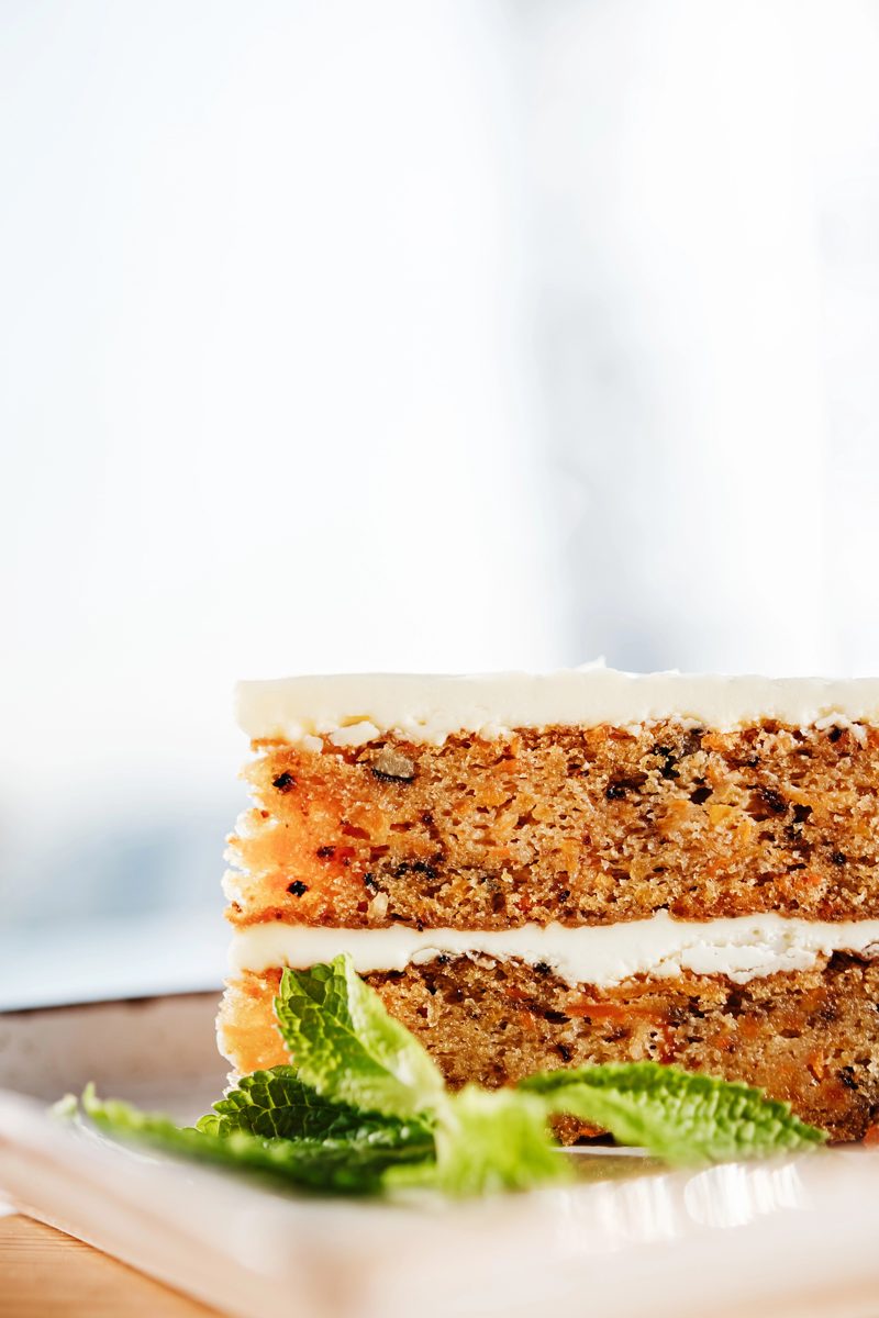 Slice of layered walnut cake