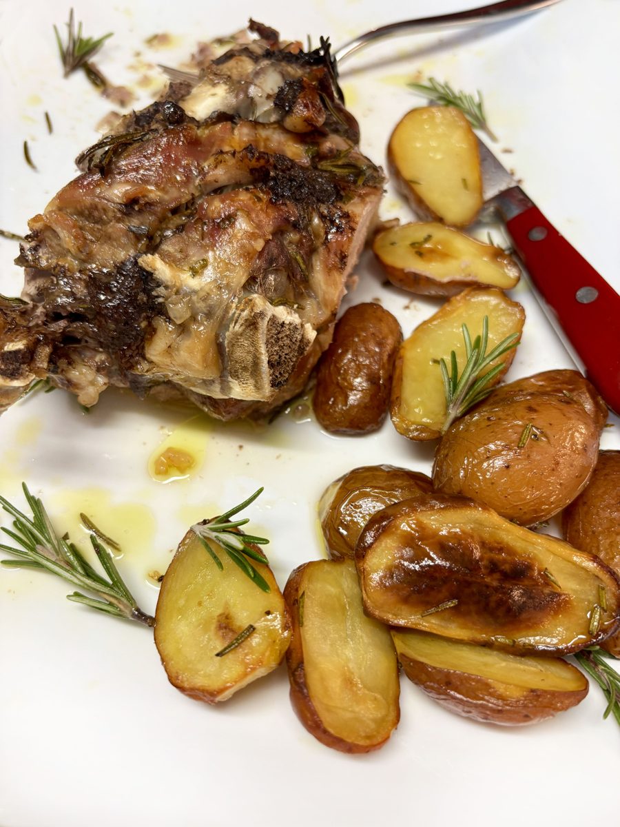 Roast lamb with crispy baked new potatoes