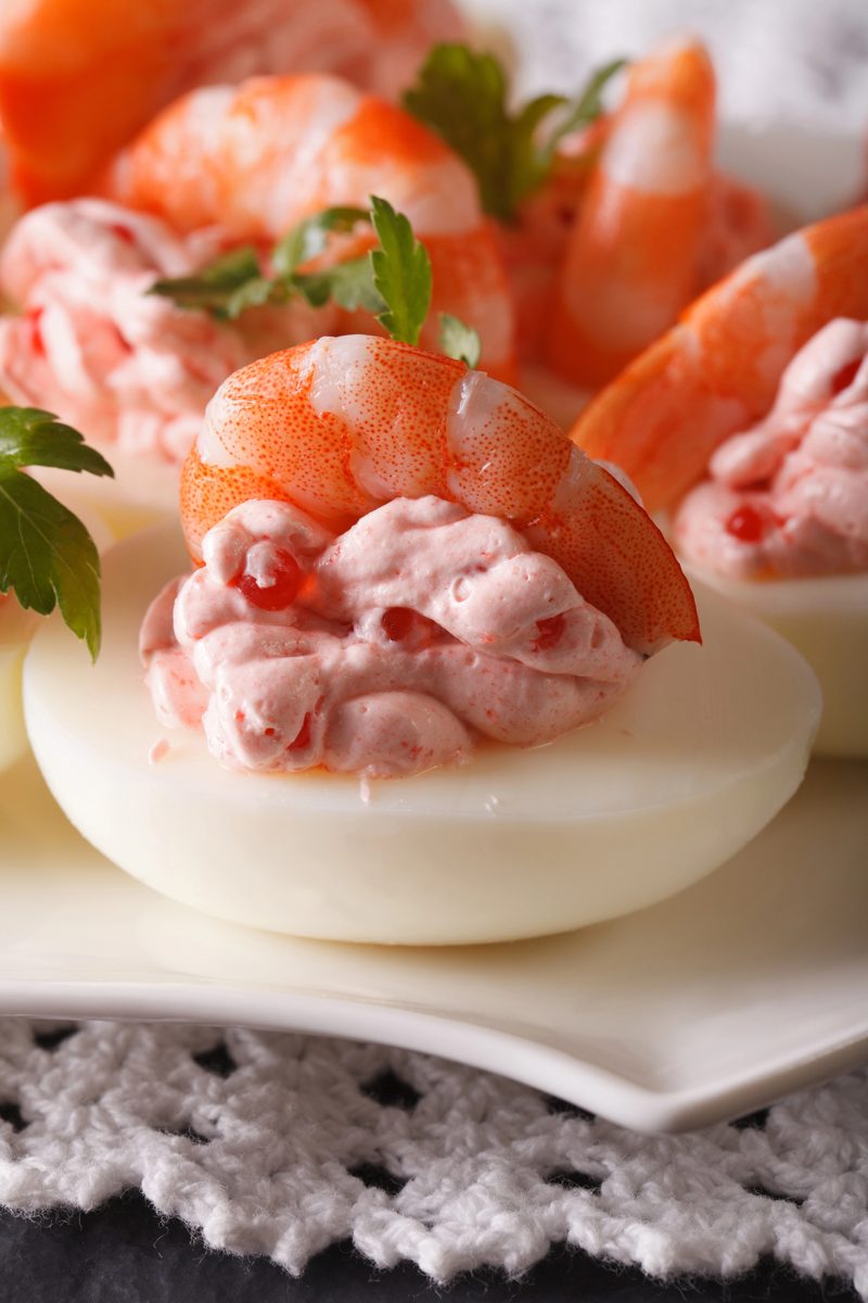 Egg halves topped with shrimp and roe