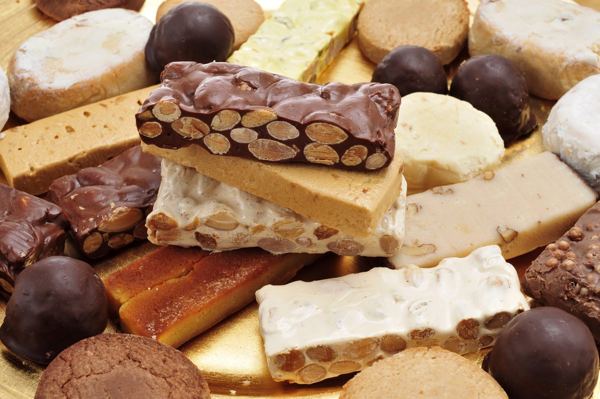 Assortment of Spanish Christmas sweets: turrón, polvorones and mantecados