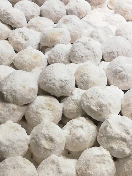 Kourabiedes almond cookies covered in powdered sugar