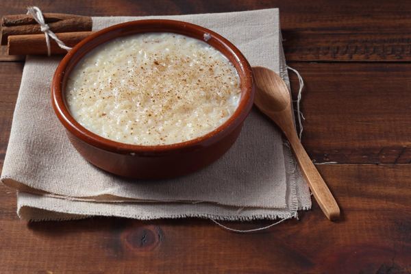 Arroz doce rice pudding with cinnamon in a bowl