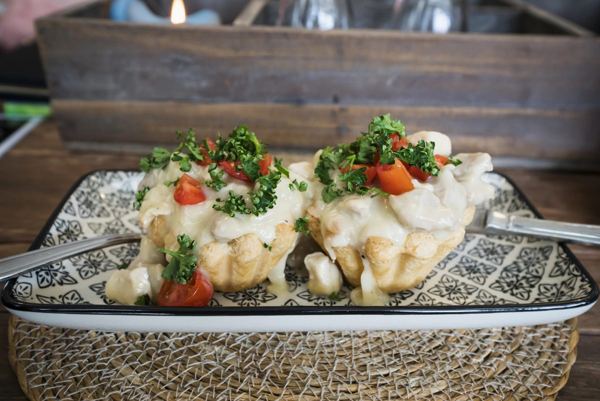 Puff pastry tartlets filled with creamy chicken and asparagus
