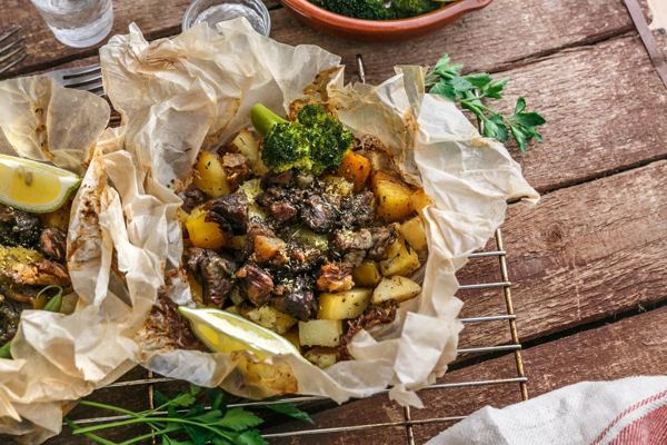 Lamb kleftiko with potatoes baked in parchment paper