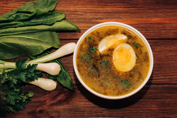 Green sorrel borscht with a boiled egg