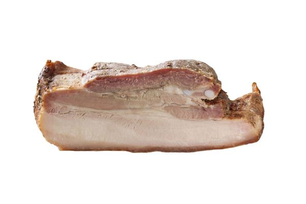 Piece of roast pork with a layer of fat
