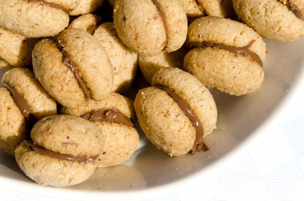 Baci di dama, small hazelnut sandwich cookies with chocolate filling